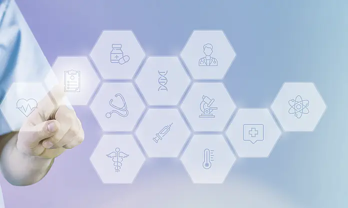 EN: Doctor pointing at digital healthcare icons