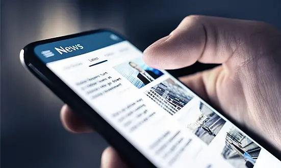 Smartphone displaying a news feed – teaser image for ASC news, press releases and corporate updates