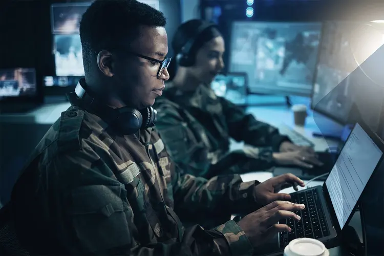 Secure military communication in line with JITC certification standards Military IT specialist working on secure communication systems compliant with JITC standards